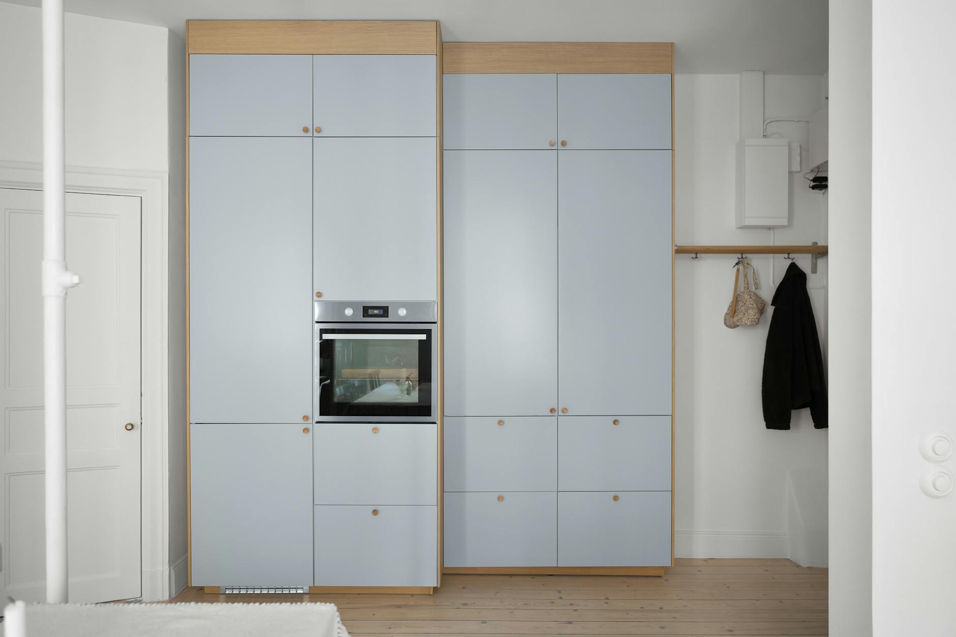 Contemporary office space with efficient storage organization and modern furniture