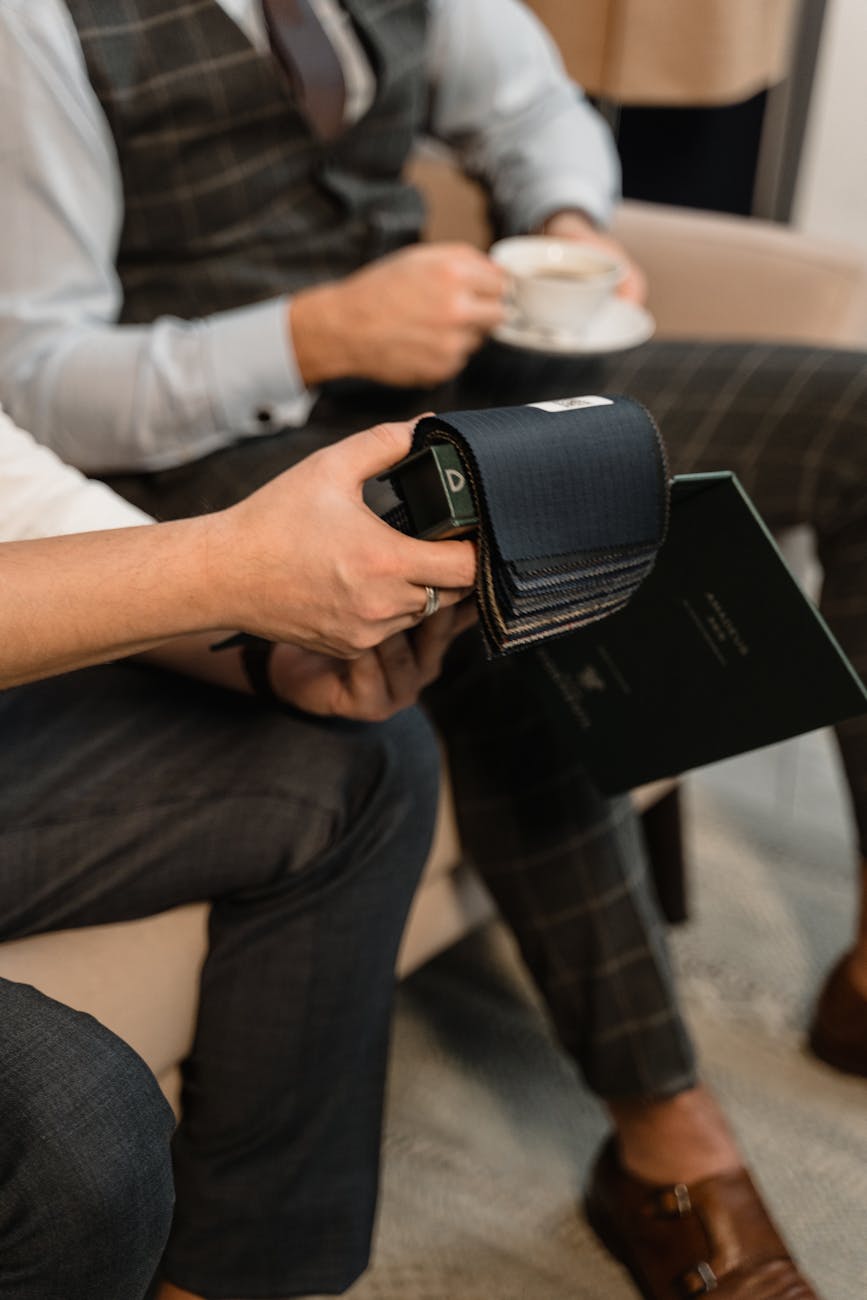 Professional interior designer presenting custom storage solutions to satisfied client